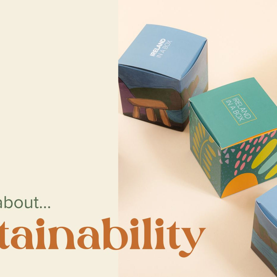 A colourful collection of square conference and event gift box. Each gift box has 'Ireland in a Box' on its lid.