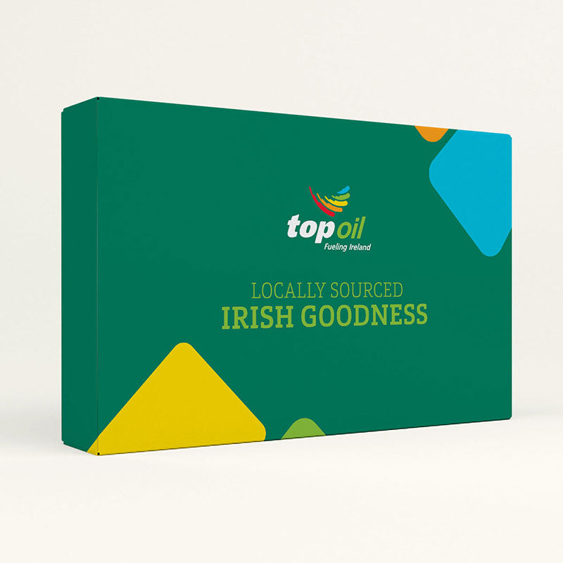 A dark green box with colourful blue, orange and yellow corners. There is a Top Oil logo on the front of the gift box along with the text 'Locally Sourced Irish Goodness' in light green.